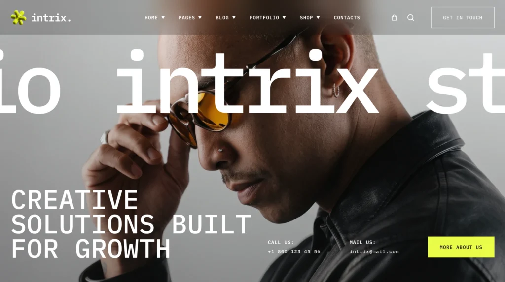 Intrix WordPress theme — homepage 1 hero: Creative Solutions Built for Growth, editorial full-viewport layout